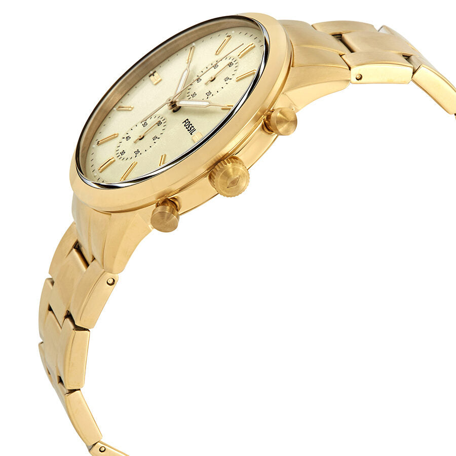 Side angled view of Fossil Townsman chronograph watch with gold bracelet