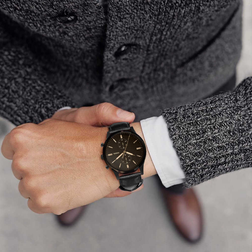 Fossil Townsman FS5585 chronograph watch worn on wrist with black leather strap