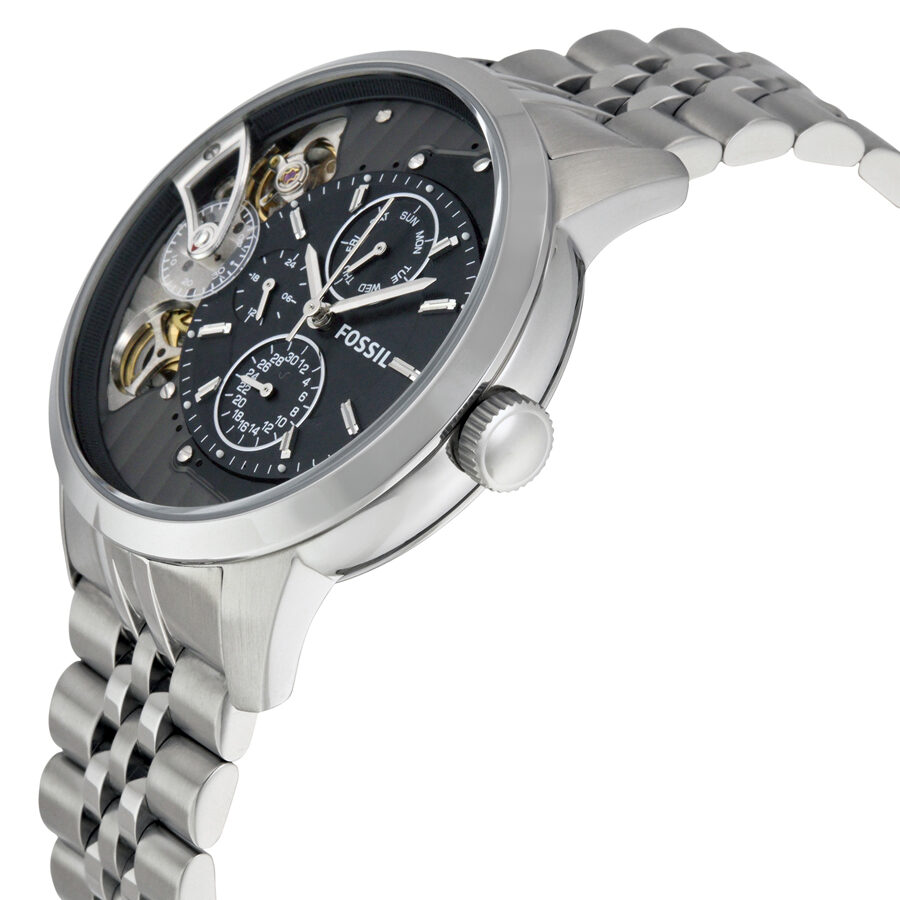 Fossil Townsman watch angled view showing silver-tone stainless steel case and linked bracelet with black dial