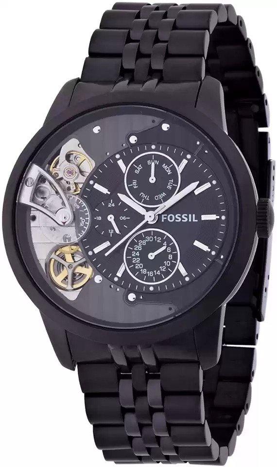 Fossil Townsman multi-function chronograph watch with black dial, visible skeleton window, and black stainless steel bracelet