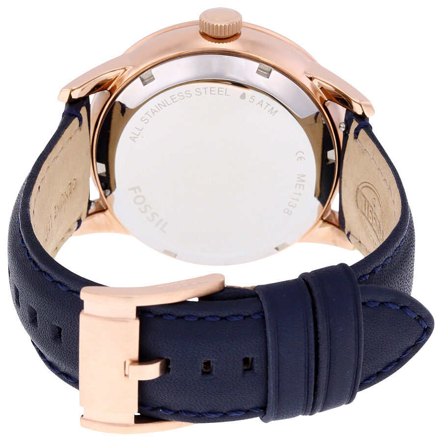 Fossil Townsman ME1138 caseback showing stainless steel with FOSSIL branding and engraved details