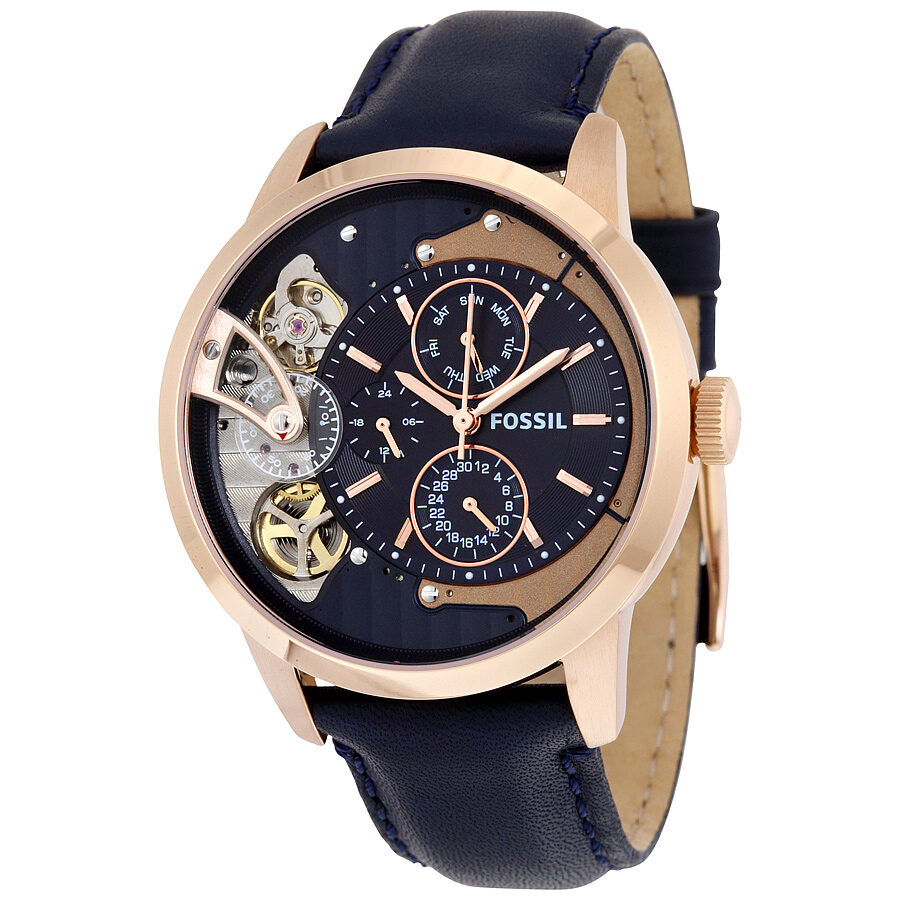 Fossil Townsman ME1138 men's watch with navy dial, rose gold case, and visible skeleton movement on navy leather strap