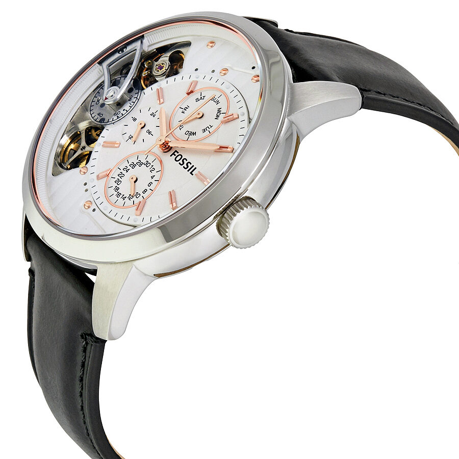 Fossil Townsman ME1164 three-quarter view showing white dial, visible gears, and stainless steel case