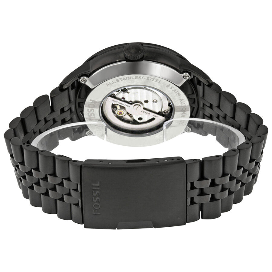 Fossil Townsman watch caseback displaying visible automatic movement with stainless steel bracelet