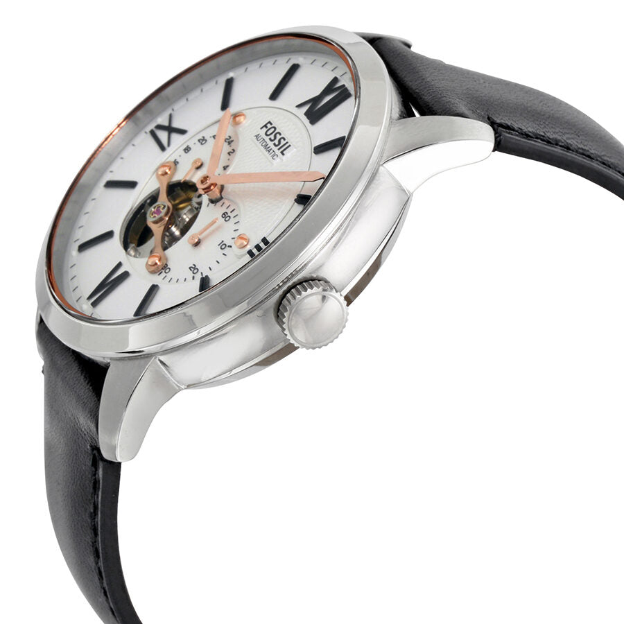 Fossil Townsman watch angled view showing white dial, rose gold hands, black leather strap and crown