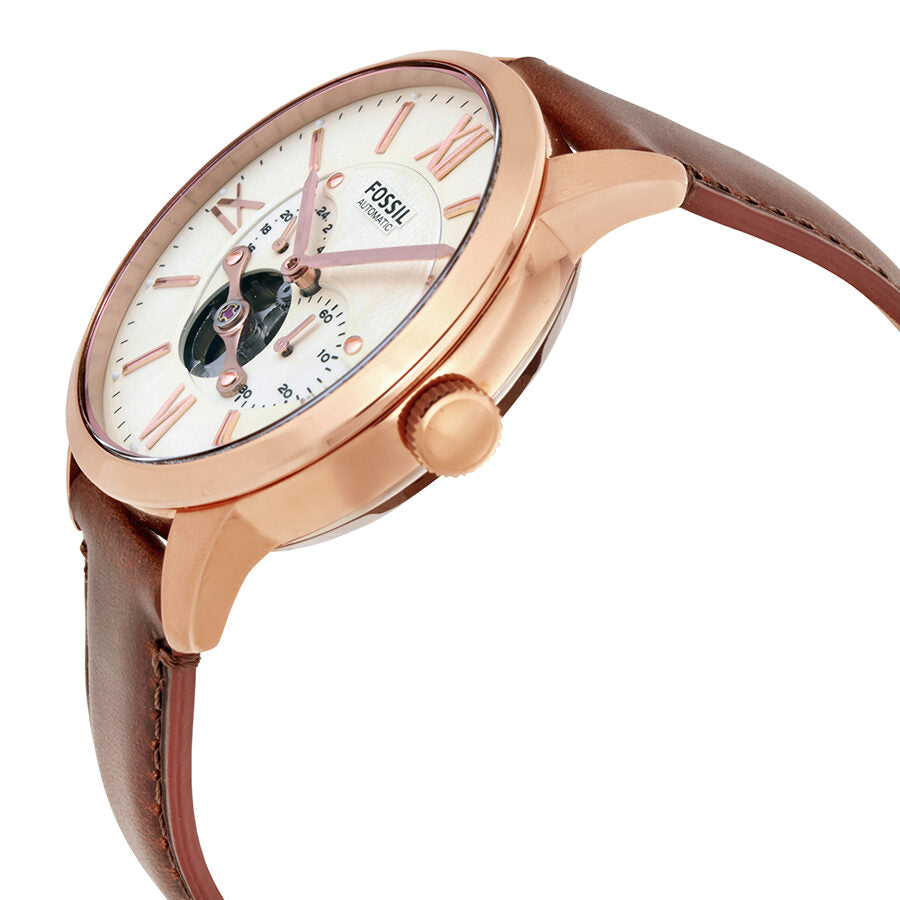 Side angle view of Fossil Townsman watch showing rose gold case and leather strap