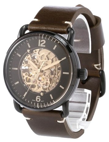 Fossil Townsman watch at angle showing brown leather strap and skeleton movement