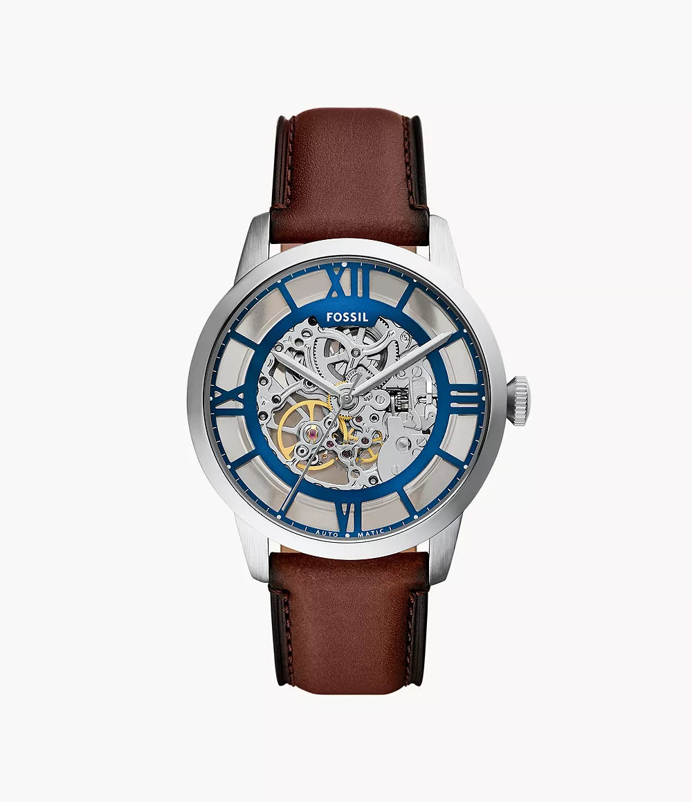Fossil Townsman automatic watch with skeleton dial, blue Roman numerals, silver case, and brown leather strap