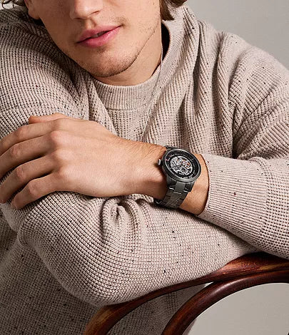 Fossil Townsman men's watch worn on wrist, smoke stainless steel with skeletal dial