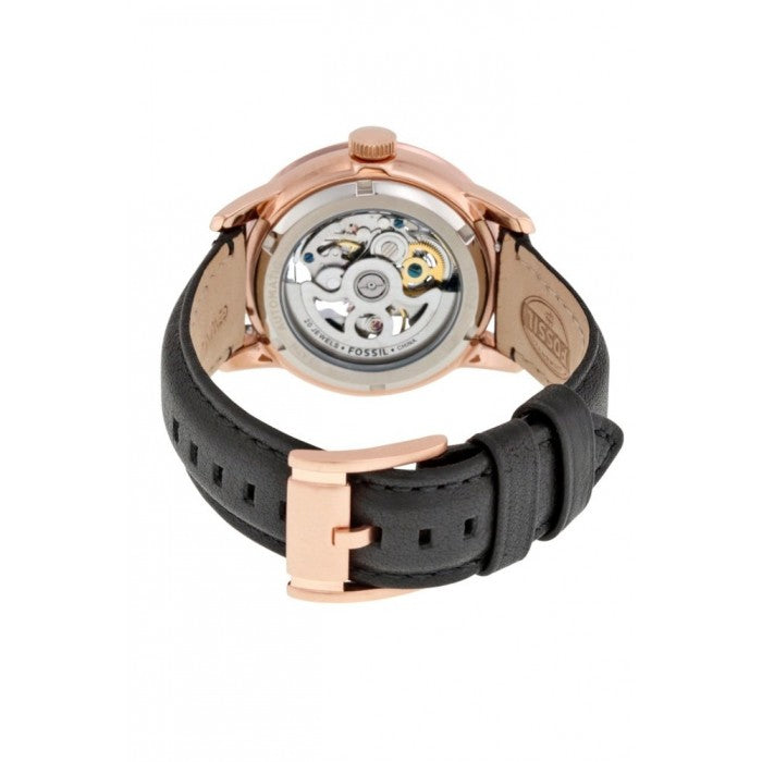Caseback view of Fossil Townsman showing visible automatic movement through transparent crystal