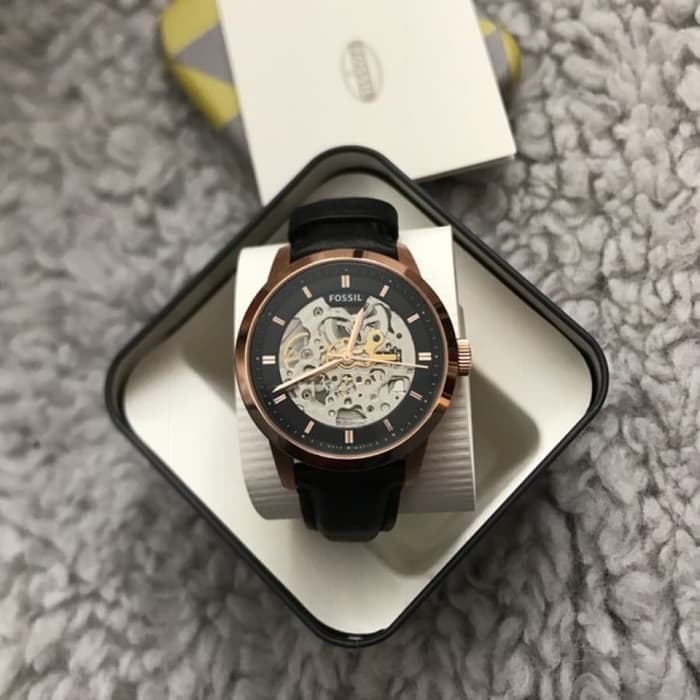 Fossil Townsman watch displayed in branded presentation box with striped pouch