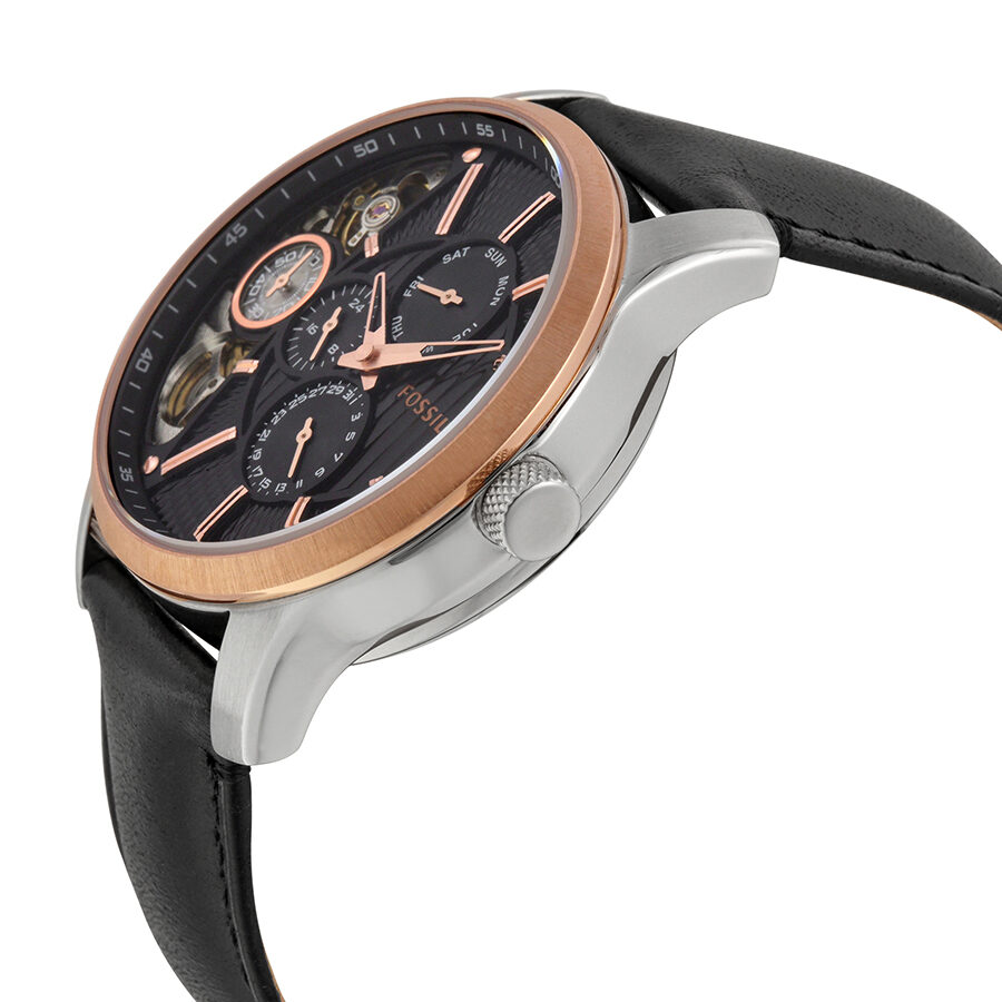 Side angle view of Fossil Twist watch showing rose gold bezel, case, and black leather strap