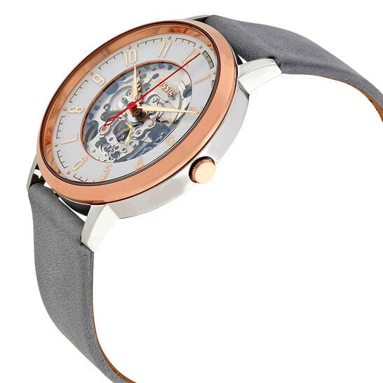 Angled view of Fossil Vintage Muse watch with visible mechanical movement and strap