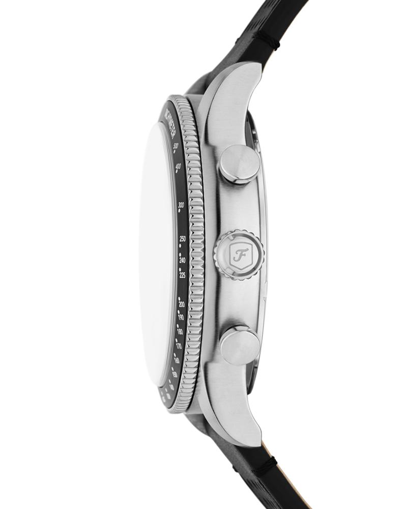 Fossil SPORT TOUR watch side profile showing polished stainless steel case and black rubber strap