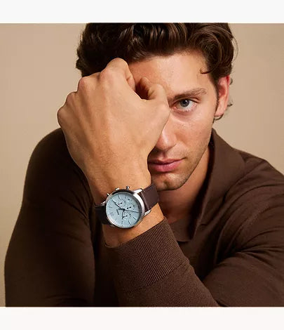 Fossil Neutra chronograph watch worn on wrist with brown leather strap