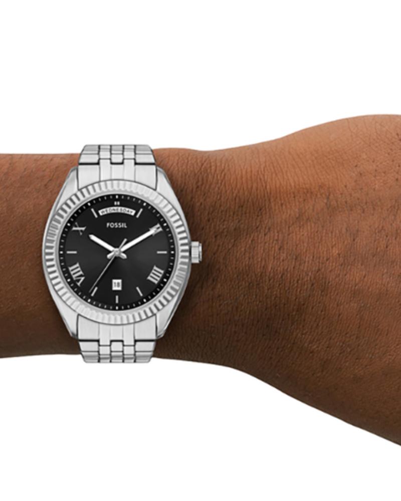 Fossil Campbell watch worn on wrist, showing 42mm case and stainless steel bracelet fit