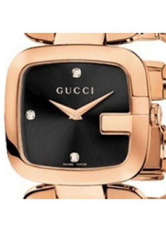 Close-up of G-Gucci YA125409 black dial with diamond hour markers and rose gold hands
