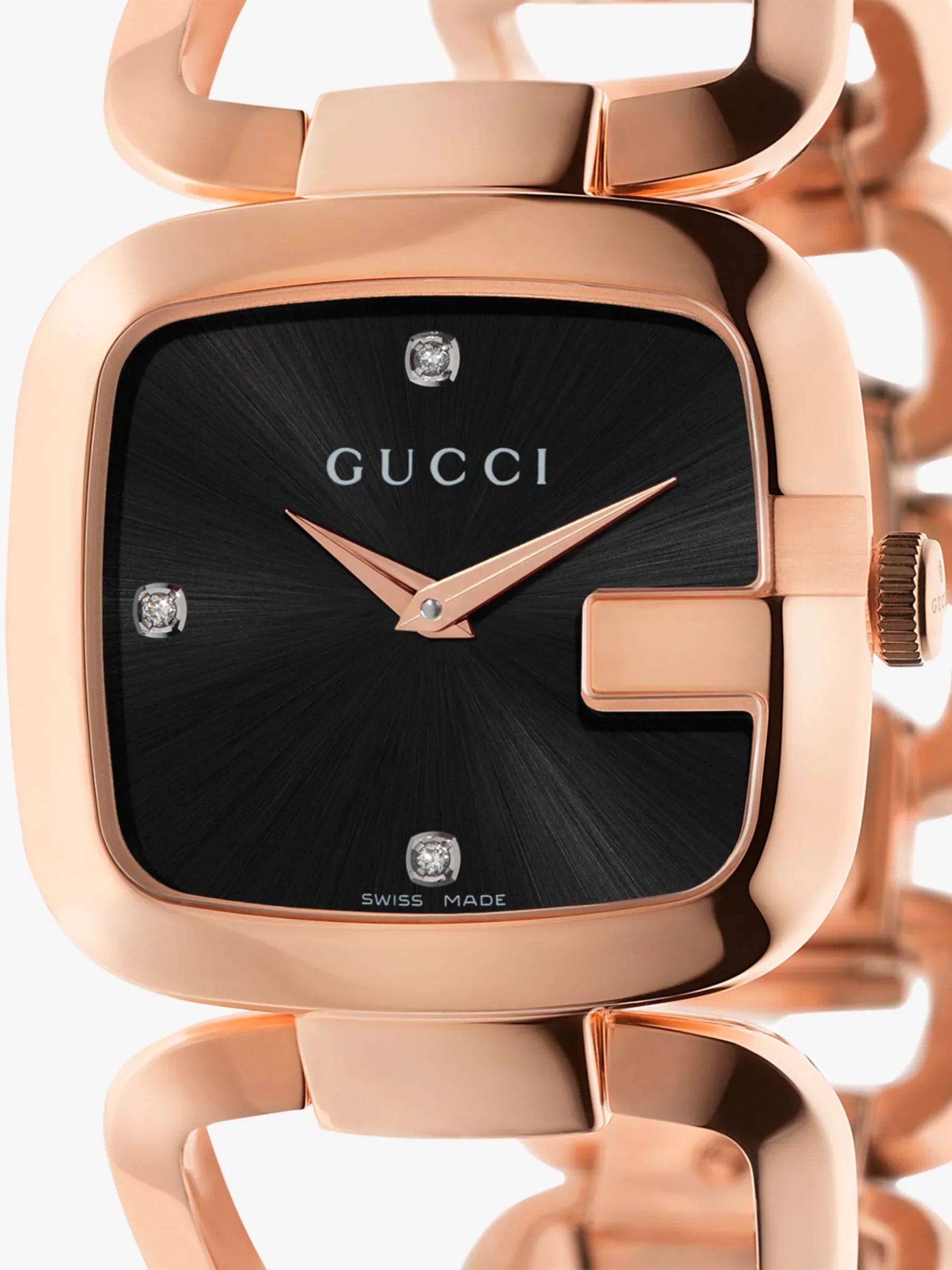 G-Gucci dial detail with black face, rose gold hands, diamond indices at 12, 3, and 6