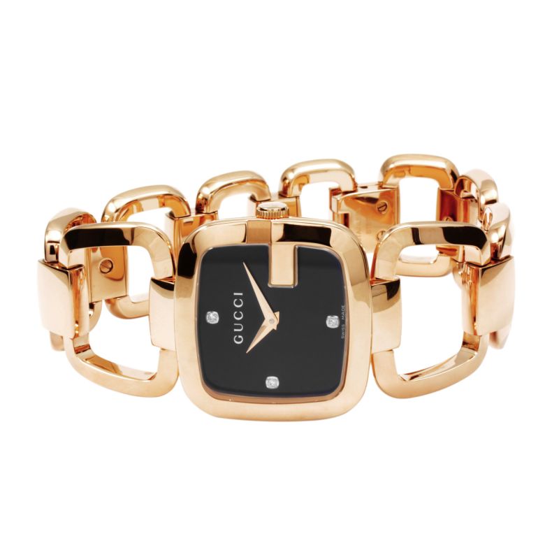 G-Gucci women's watch worn on wrist showing black dial and rose gold bracelet