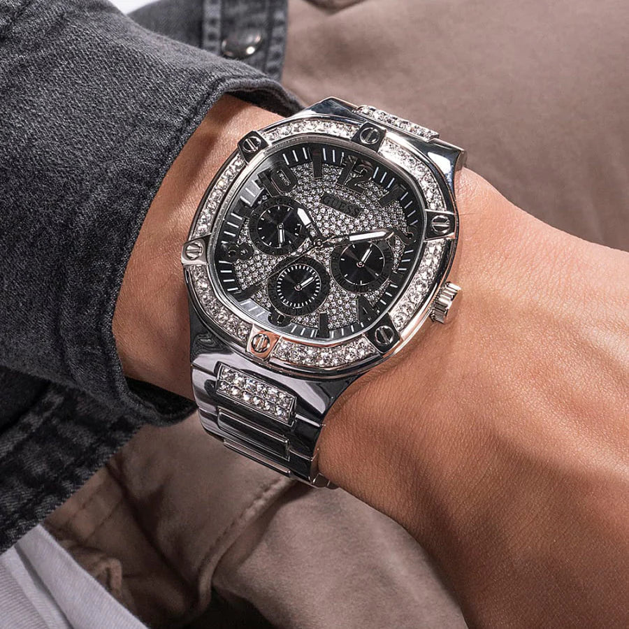 Guess Duke GW0576G1 silver chronograph watch worn on wrist, showing crystal bezel and bracelet detail