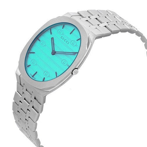 Gucci 25H watch angled view showing turquoise dial and stainless steel bracelet