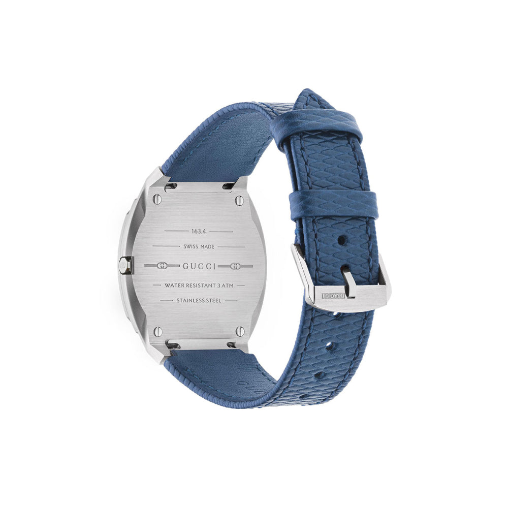 Gucci 25H caseback showing stainless steel with engraved specifications and blue leather strap