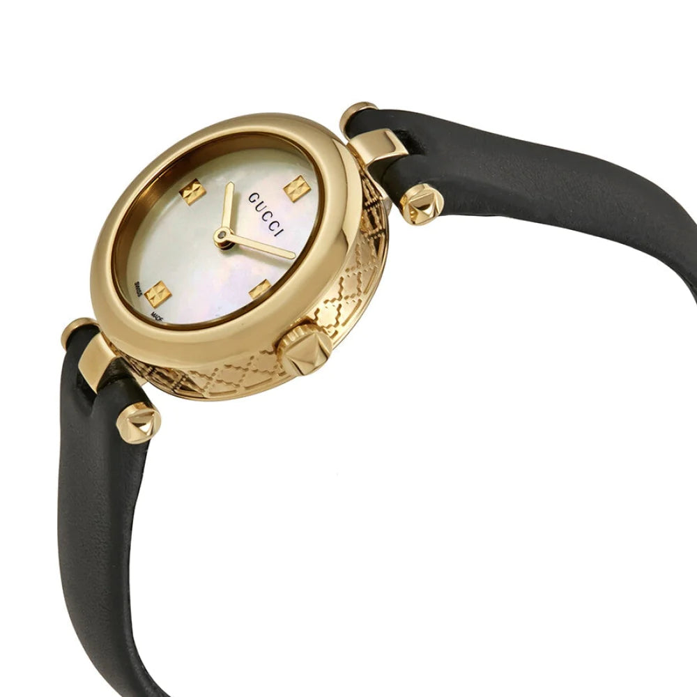 Gucci Diamantissima women's watch displayed at angle showing gold case and black strap
