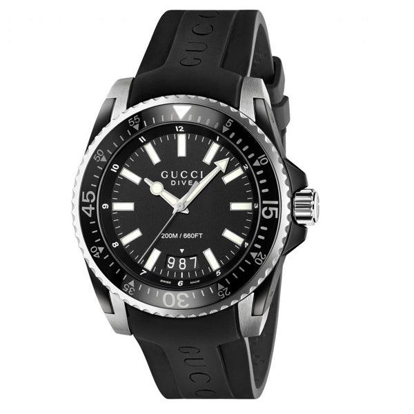 Gucci Dive quartz watch at angle showing dial and black rubber strap