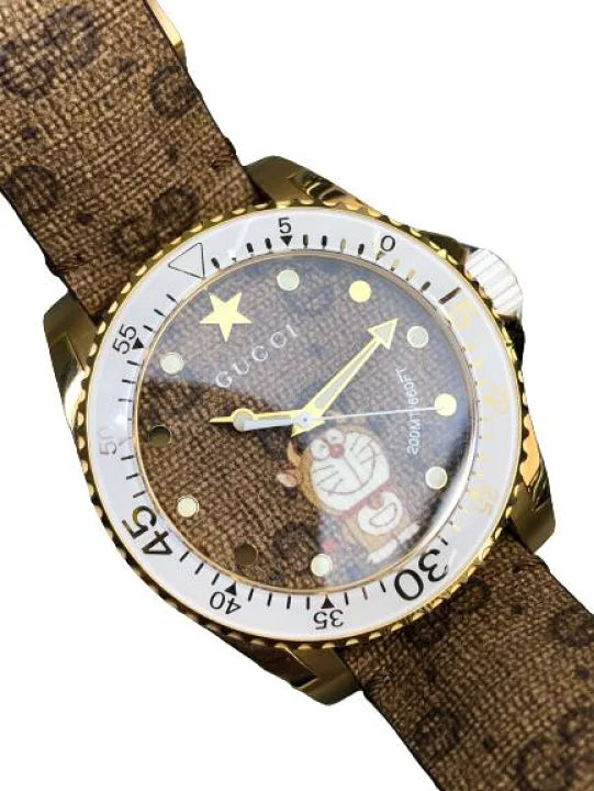 Close-up detail of Gucci Dive Doraemon brown dial with Doraemon character and gold-tone indices