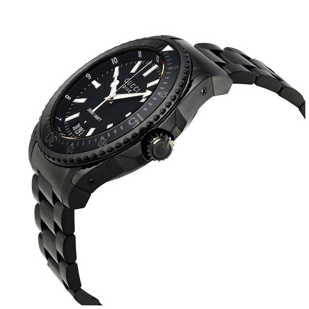 Gucci Dive watch worn on wrist showing stainless steel bracelet