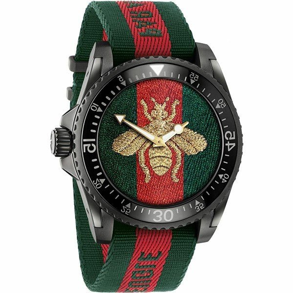 Angled view of Gucci Dive watch showing crown, black case, and embroidered bee on striped dial