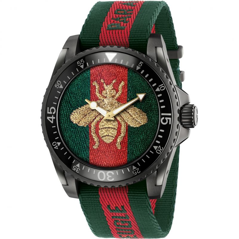 Front view of Gucci Dive men's watch with embroidered bee on red and green dial, black bezel, gold hands