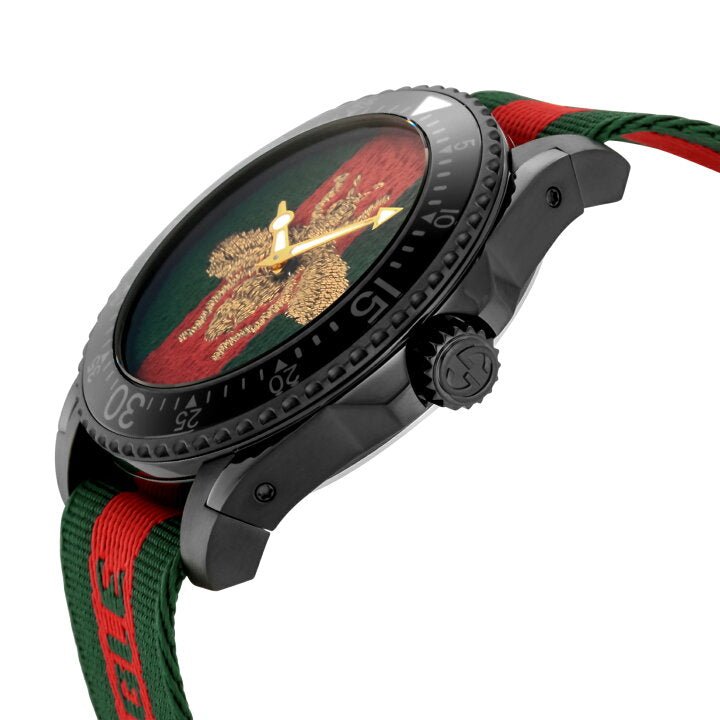 Side profile of Gucci Dive YA136216 with black case, screw crown, and green and red nylon strap