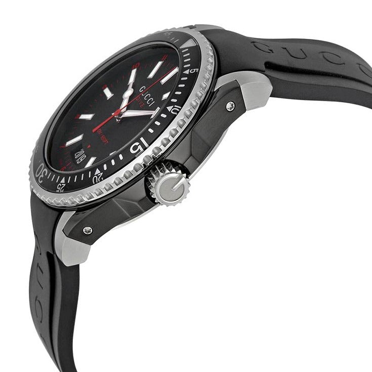 Gucci Dive watch angled side view showing stainless steel case and black rubber strap