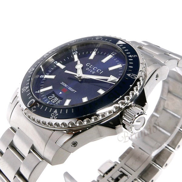Gucci Dive 40mm watch angled view of blue dial and rotating bezel