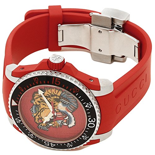 Gucci Dive 40mm watch worn showing tiger embroidered dial and stainless steel clasp