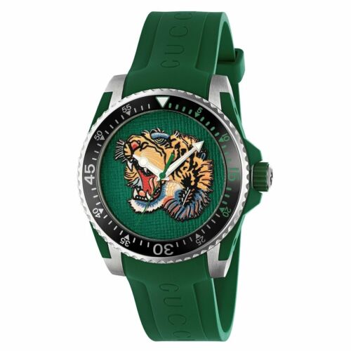 Gucci Dive YA136316 watch angled view showing green strap and stainless steel case