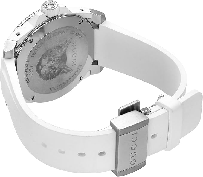 Gucci Dive watch caseback showing tiger engraving and white rubber strap with Gucci buckle