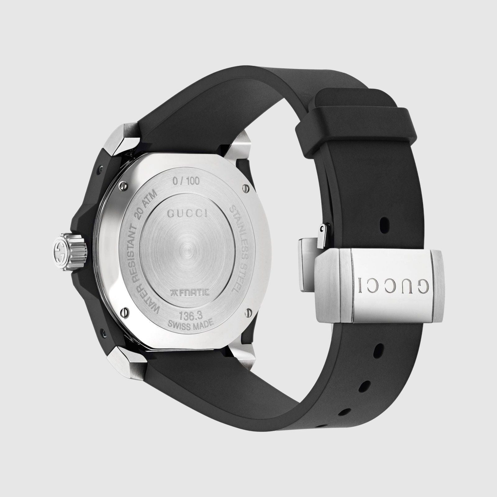 Gucci Dive caseback showing stainless steel case and black rubber strap with Gucci branding