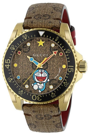 GUCCI Dive Doraemon gold watch with Doraemon character on black dial and canvas strap