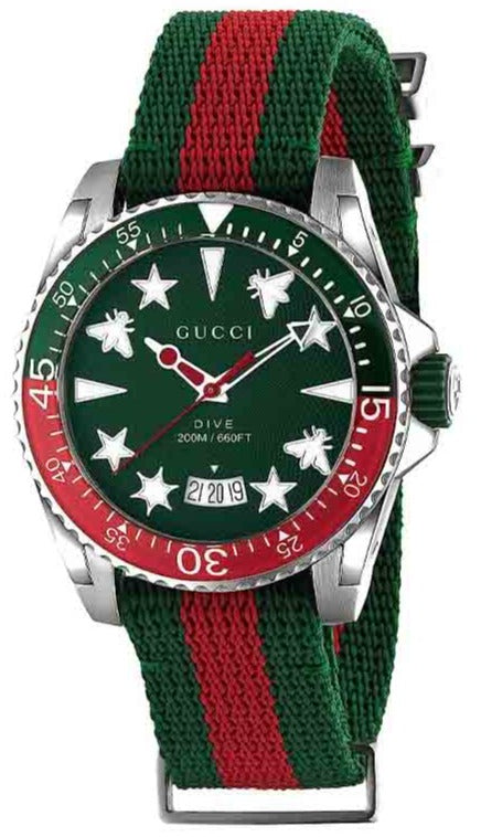 Gucci Dive watch with green dial, white star markers, red and green fabric strap