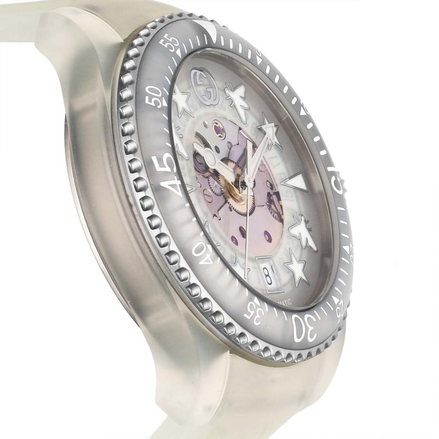 Gucci Dive watch angled view showing white rubber strap and dial profile