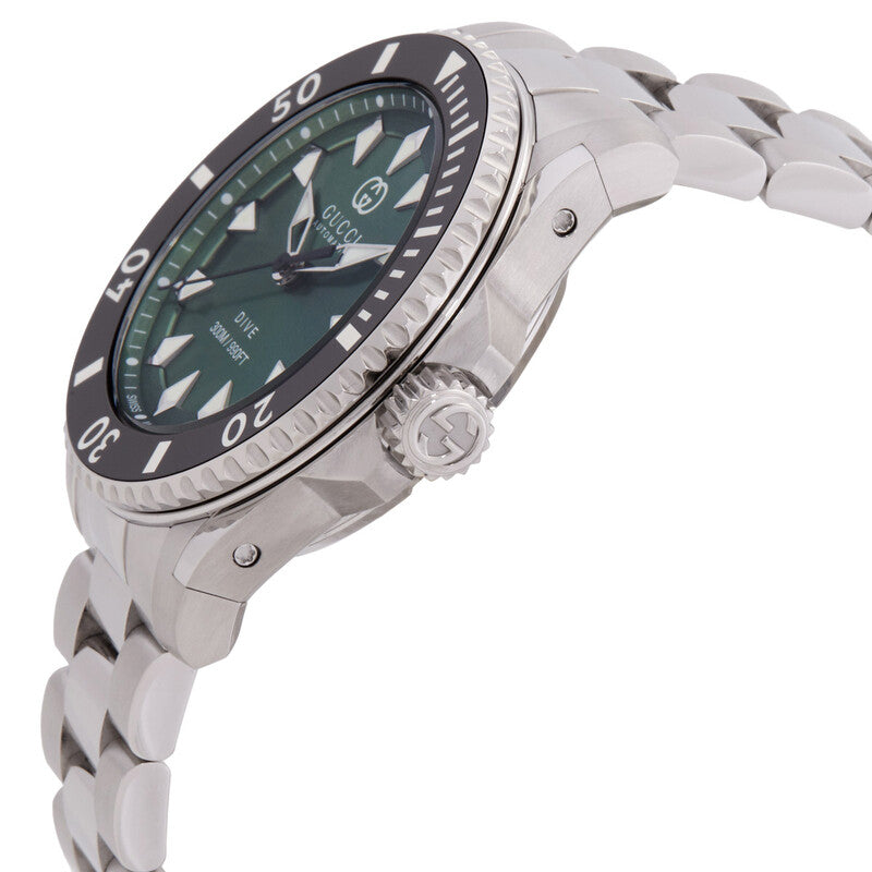 Gucci Dive watch angled view showing green dial and stainless steel bracelet with crown