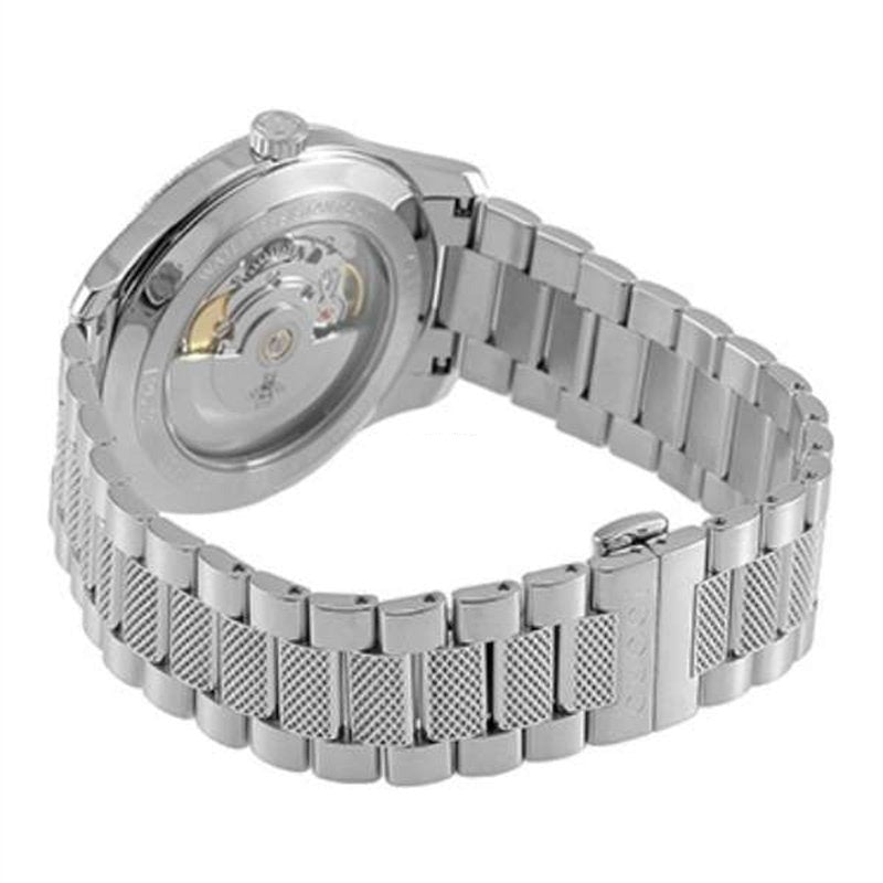 Gucci Eryx watch caseback showing automatic movement and steel case construction