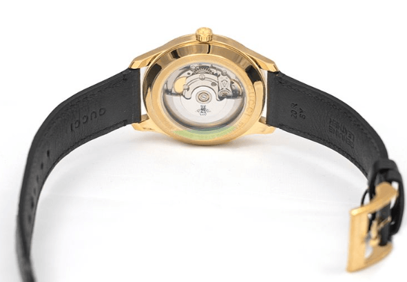 Gucci Eryx watch caseback showing automatic movement and transparent exhibition display