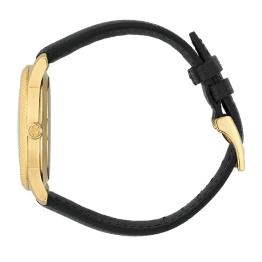 Gucci Eryx watch side profile showing gold case thickness and black leather strap