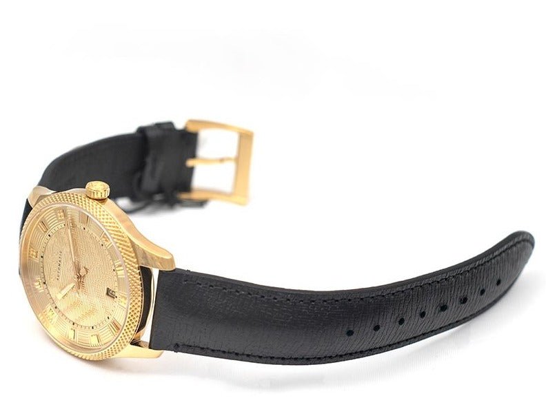 Gucci Eryx watch with black leather strap and gold buckle clasp