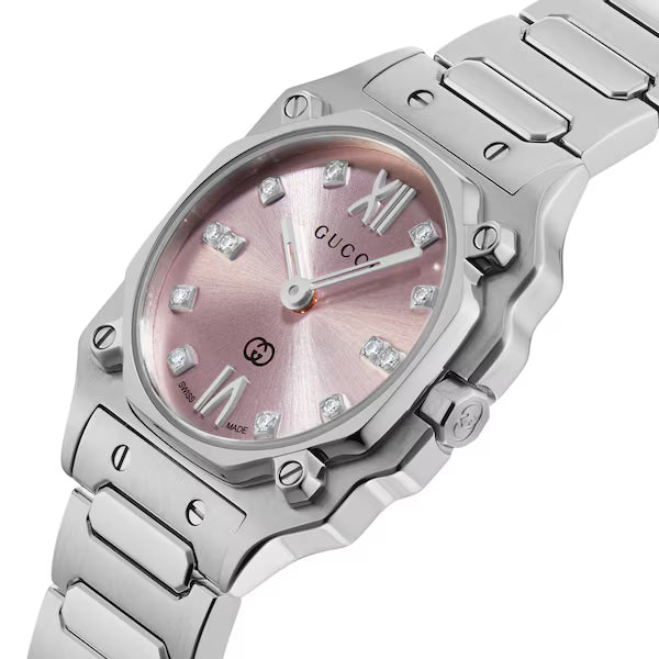 Gucci G-Flat watch on wrist showing pink dial with diamond indices and Roman numerals