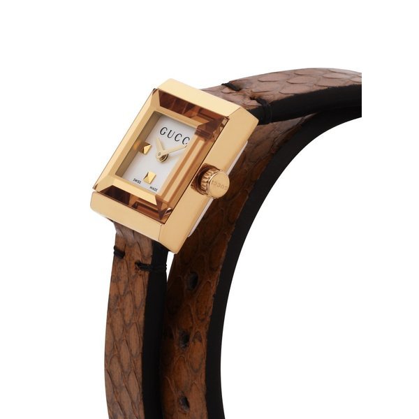 Side angle view of Gucci G-Frame watch with gold plated case and brown leather strap