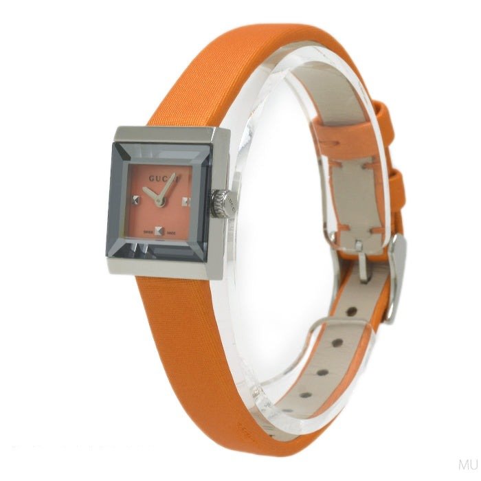 Gucci G-Frame women's watch showing orange leather strap with buckle and caseback detail